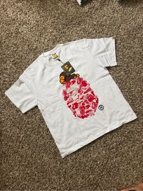 Bape Kids White Tee with Pink Camo Ape Head Graphic